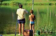 Father and son enjoying a day of fishing